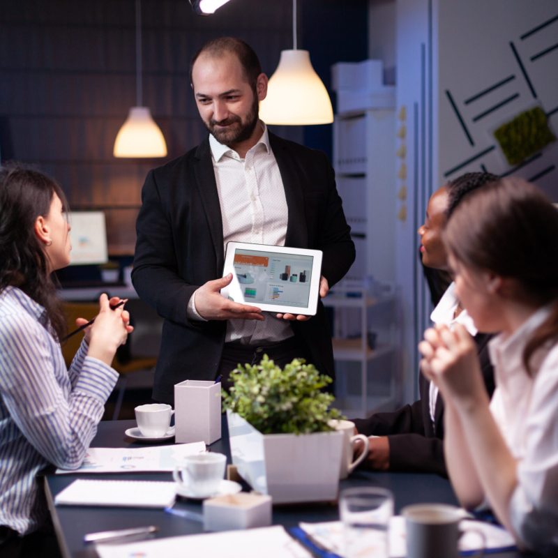 entrepreneur-businessman-showing-company-strategy-using-tablet-corporate-presentation-scaled.jpg